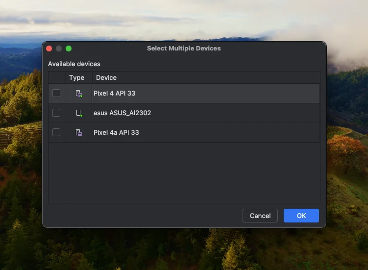 Dialog Select Multiple Devices dengan kotak centang untuk memilih beberapa emulator